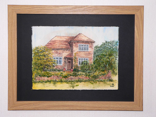 embroidered picture of house